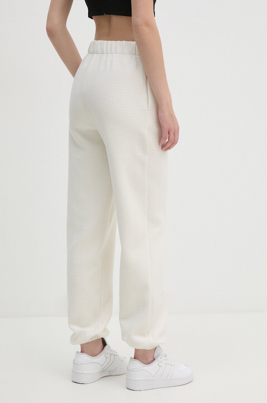Calvin Klein Jeans melegítőnadrág bézs, sima, J20J223920 termék 2. képe