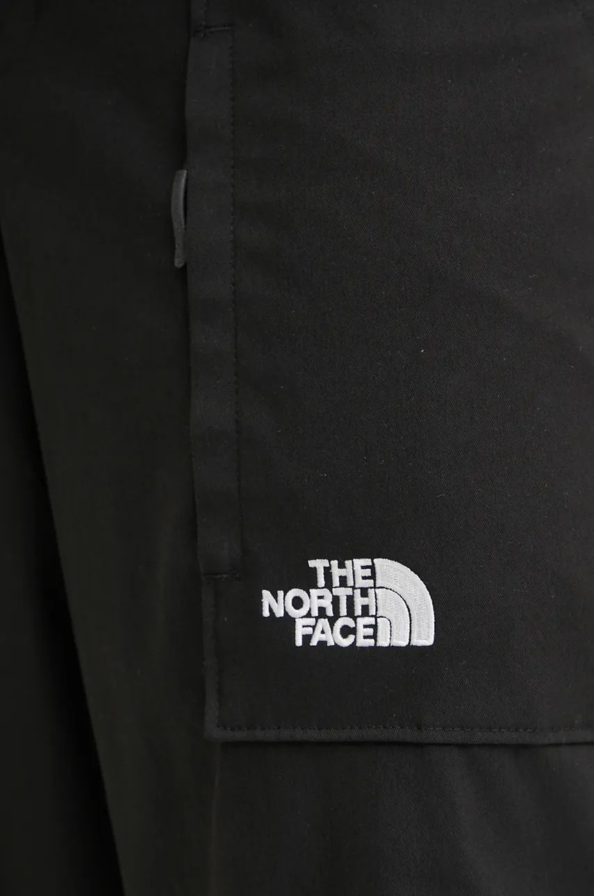 Hlače The North Face TNF x Yinka Ilori za žene, boja: crna, ravni kroj, srednje visoki struk, NF0A89GHJK31