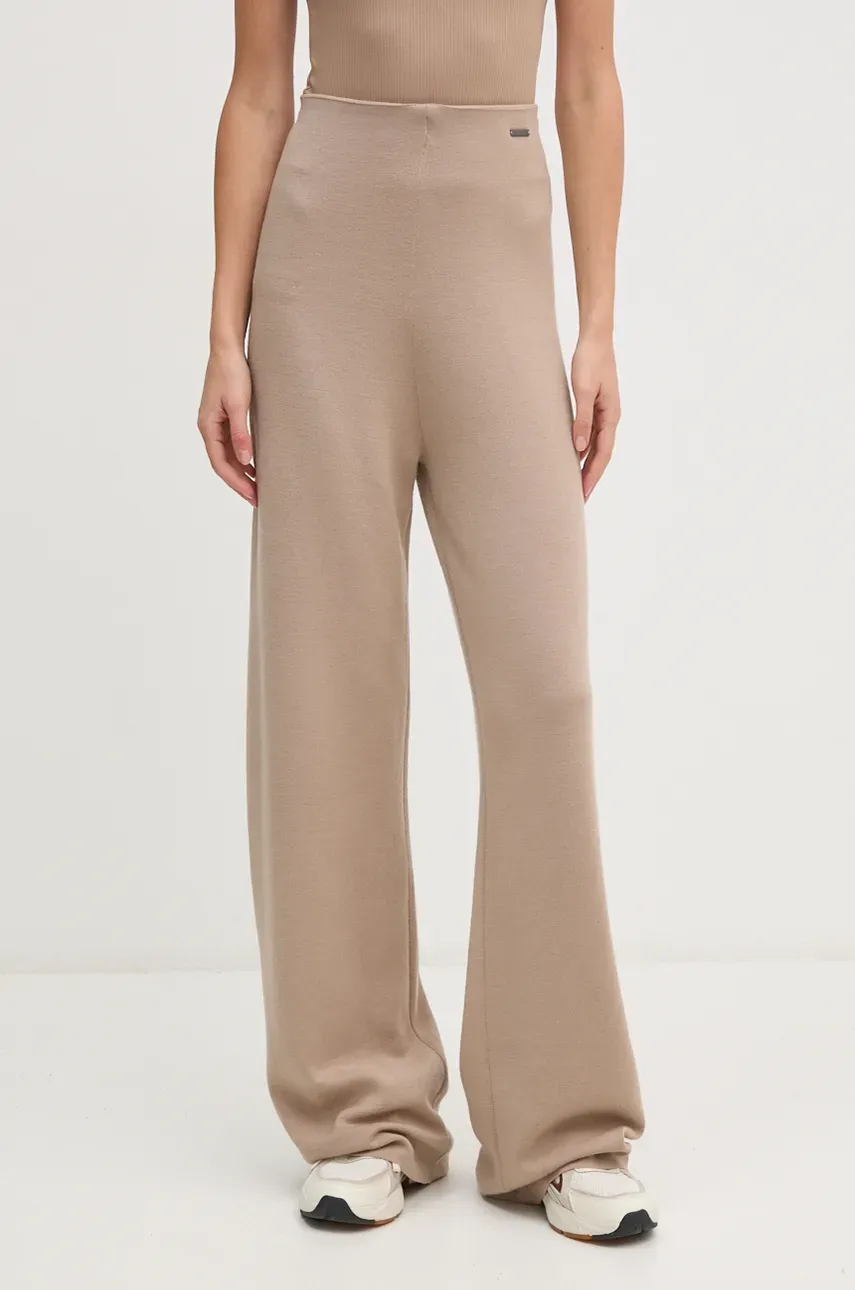 Levně Vlněné tepláky Calvin Klein šedá barva, K20K207680