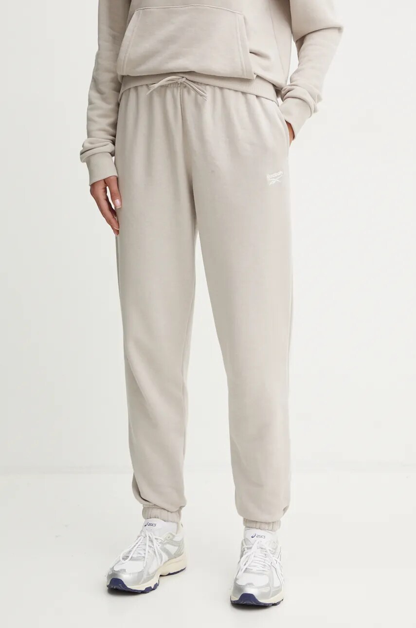 Reebok pantaloni de trening culoarea bej, neted, 100205955
