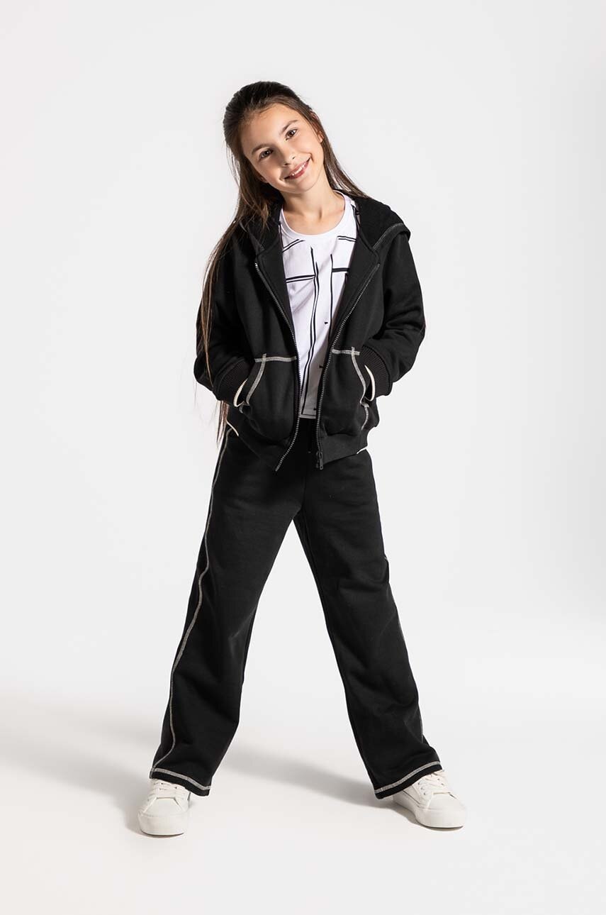 Coccodrillo pantaloni de trening din bumbac pentru copii culoarea negru, neted, CARTOONS GIRL JUNIOR Coccodrillo pantaloni de trening din bumbac pentru copii culoarea negru, neted, CARTOONS GIRL JUNIOR