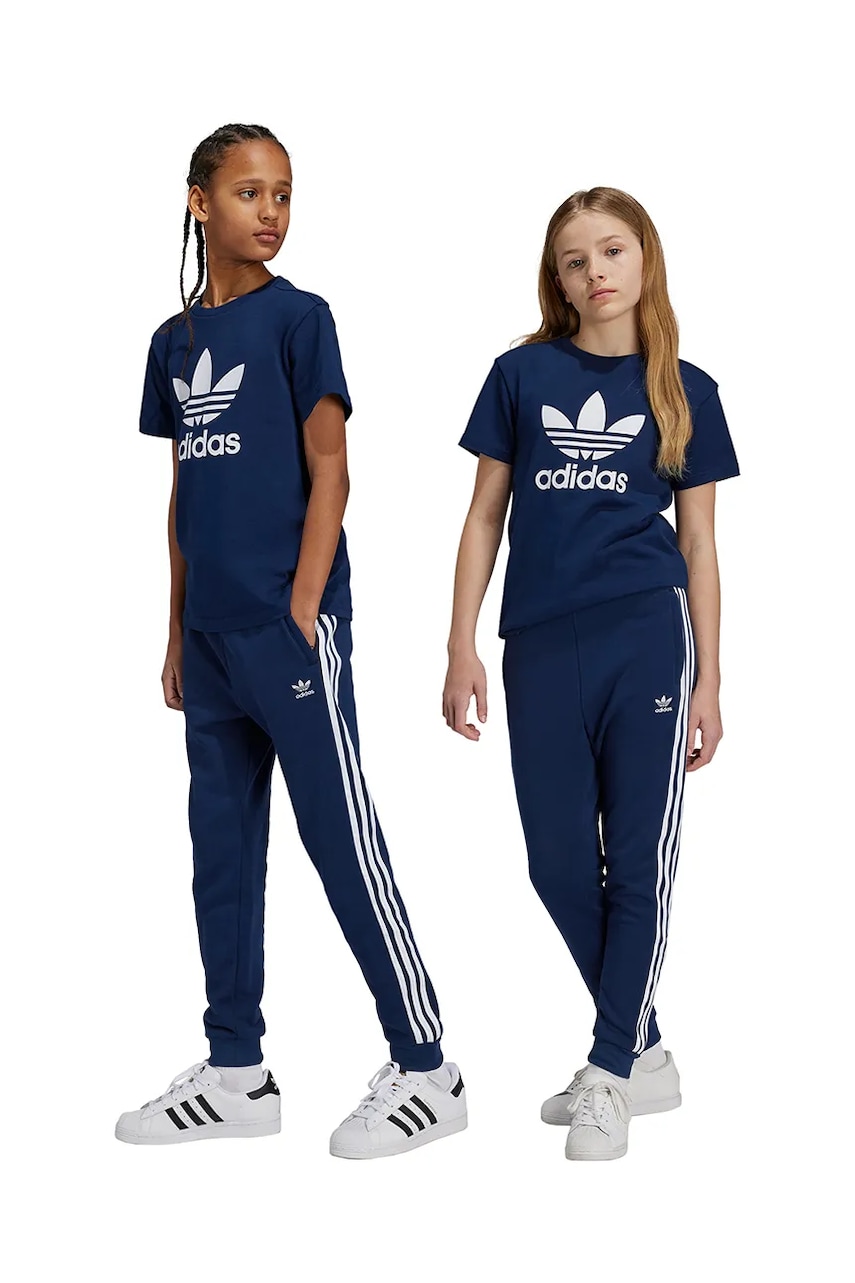 adidas Originals pantaloni de trening pentru copii TREFOIL PANTS culoarea albastru marin, cu imprimeu, IY7486 adidas Originals pantaloni de trening pentru copii TREFOIL PANTS culoarea albastru marin, cu imprimeu, IY7486