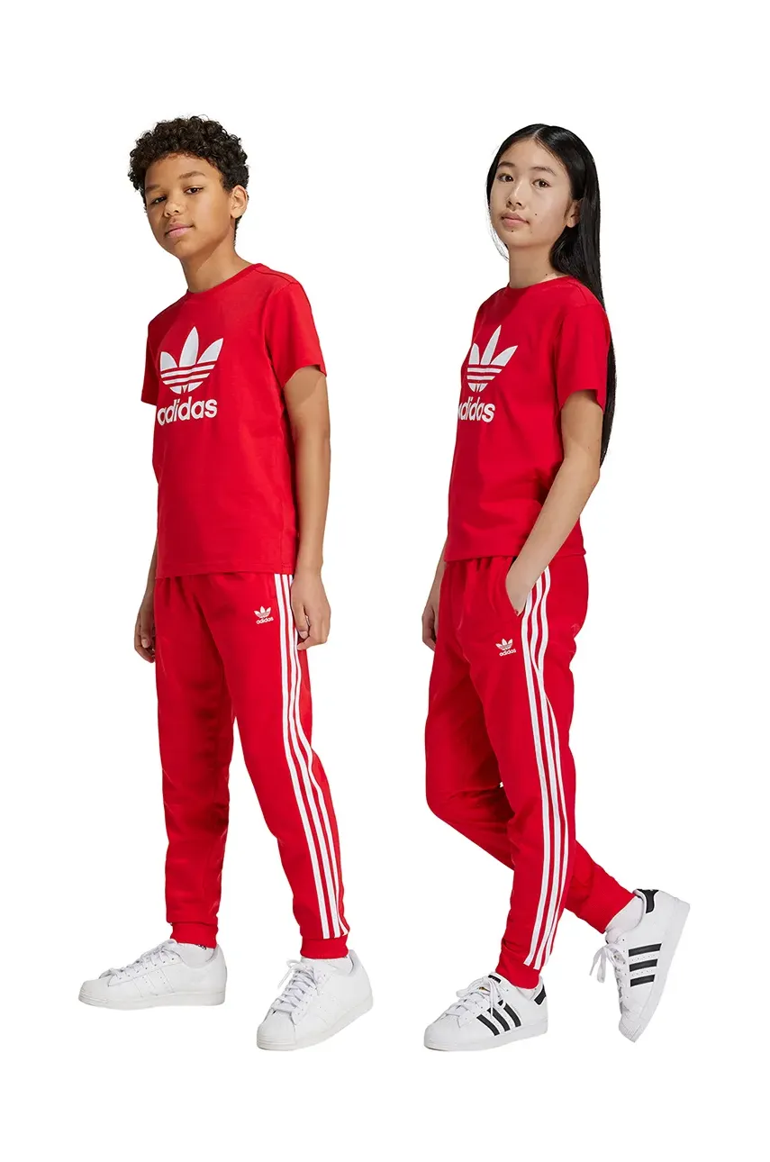 adidas Originals pantaloni de trening pentru copii SST TRACK PANTS culoarea rosu, cu imprimeu, IX7631