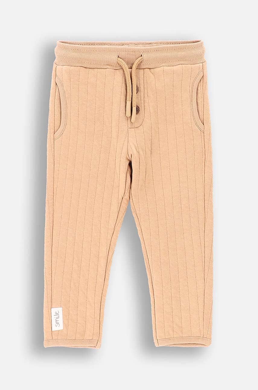 Coccodrillo pantaloni de trening pentru copii culoarea bej, neted, SMILE BOY NEWBORN Coccodrillo pantaloni de trening pentru copii culoarea bej, neted, SMILE BOY NEWBORN
