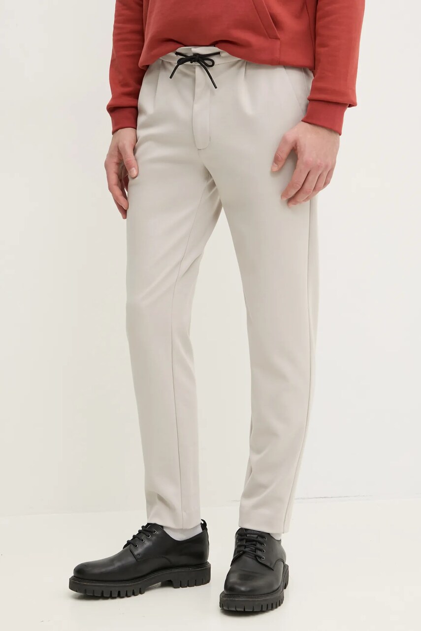 Levně Kalhoty Calvin Klein pánské, béžová barva, přiléhavé, K10K113648