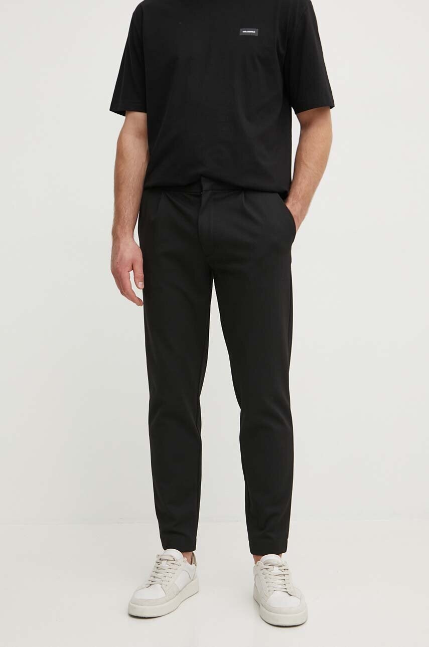 Levně Kalhoty Calvin Klein pánské, černá barva, přiléhavé, K10K113648