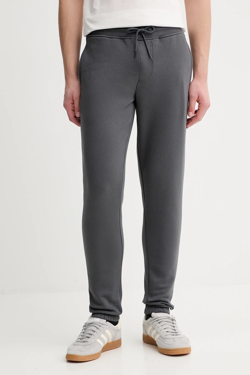 Tommy Jeans pantaloni de trening culoarea bleumarin, uni, DM0DM20473