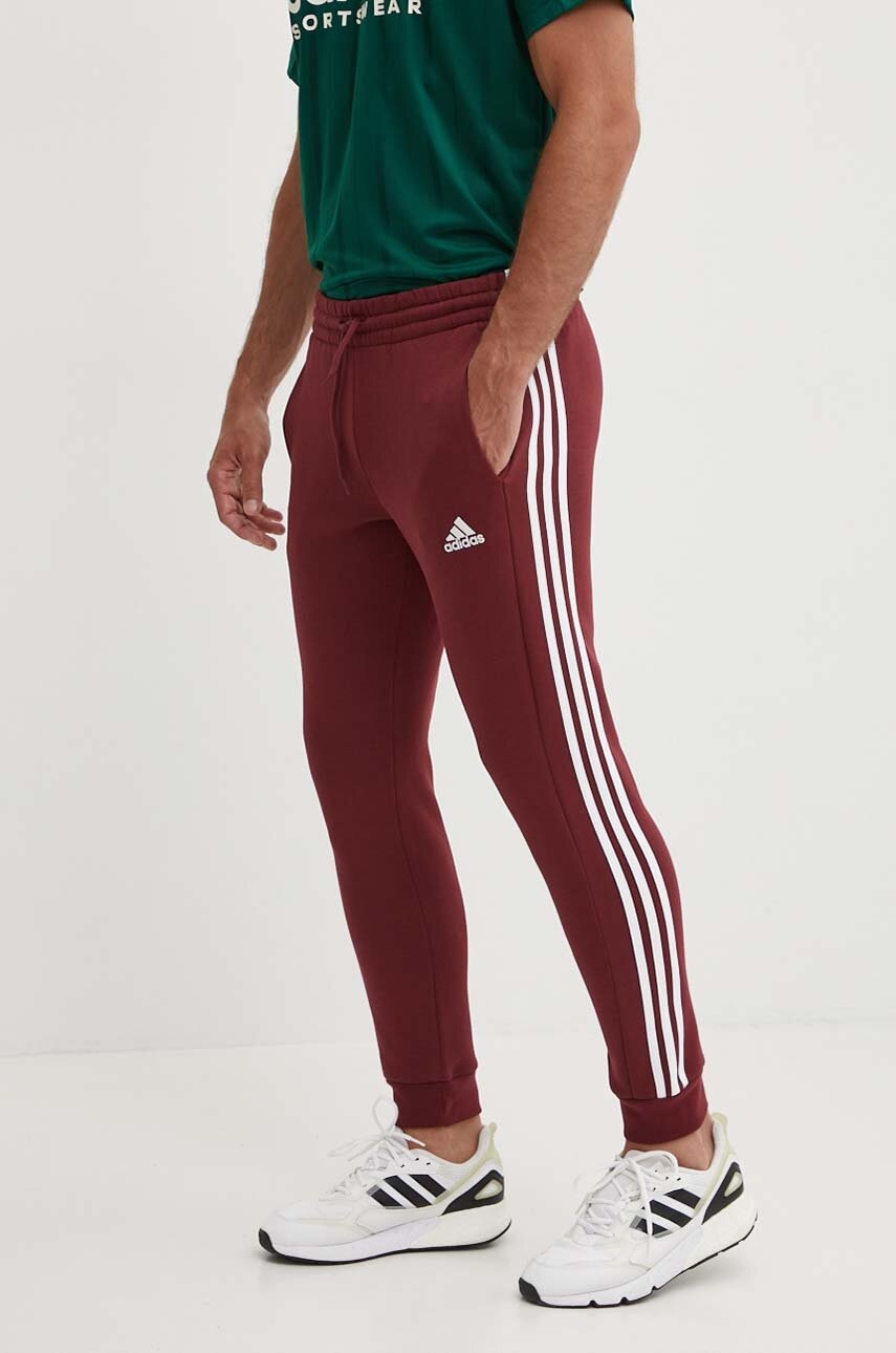 adidas pantaloni de trening Essentials culoarea bordo, cu imprimeu, JG5951