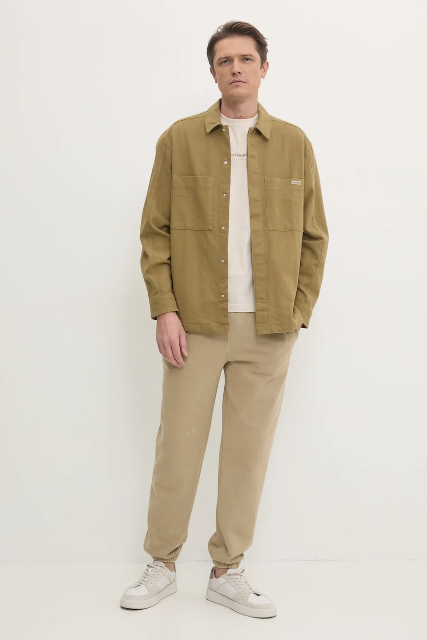 Хлопковые спортивные штаны Lacoste цвет бежевый однотонные XH2852 Хлопковые спортивные штаны Lacoste цвет бежевый однотонные XH2852