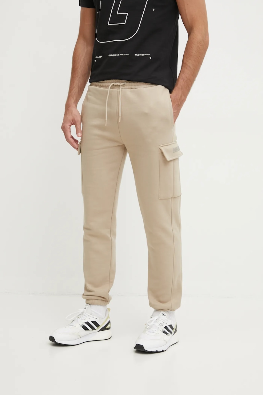 Levně Tepláky Guess KEID béžová barva, hladké, Z4BB09 KCEA0