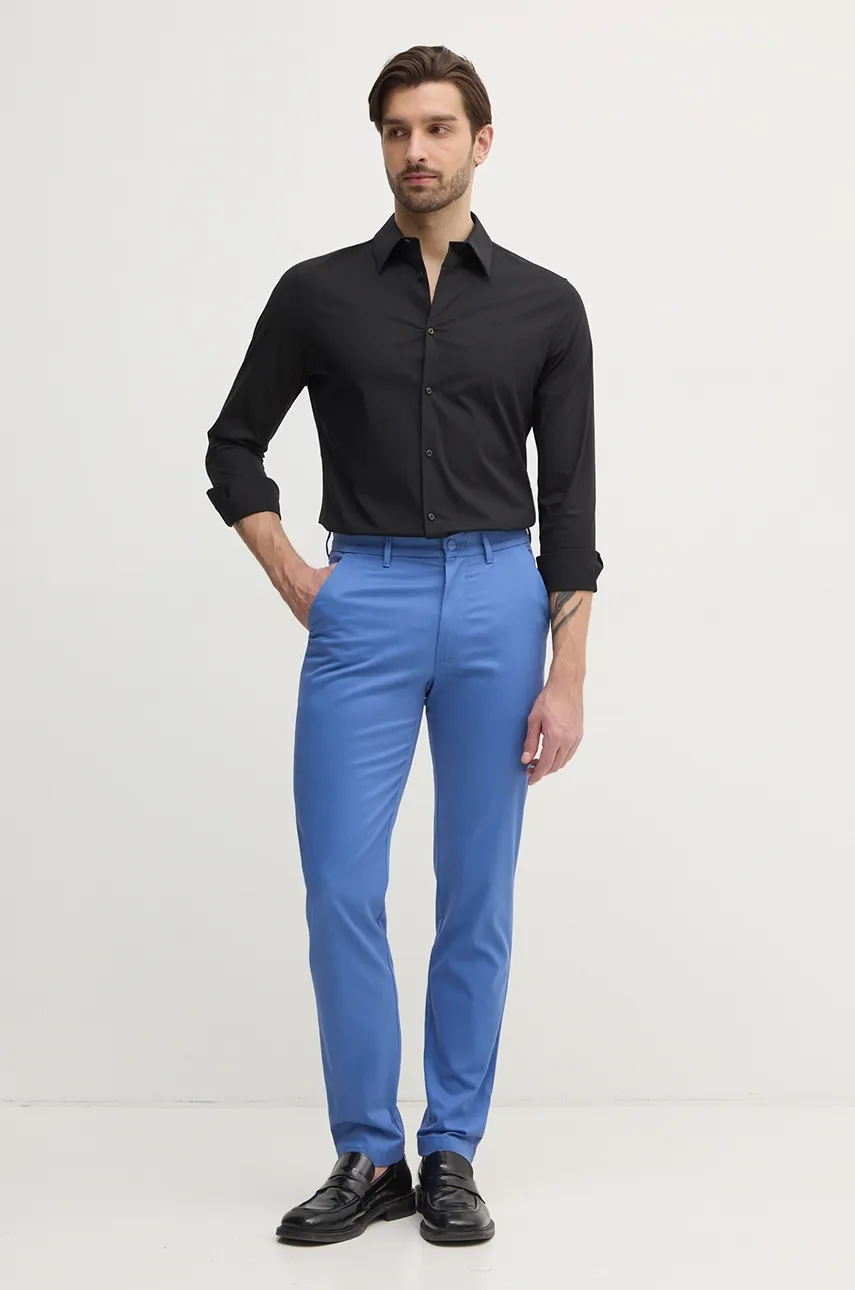 Брюки Calvin Klein мужские цвет серый облегающие K10K113429 Брюки Calvin Klein мужские цвет серый облегающие K10K113429