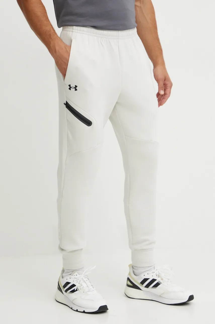 

Спортен панталон Under Armour Unstoppable Fleece в бежово с изчистен дизайн 1389353, Бежов