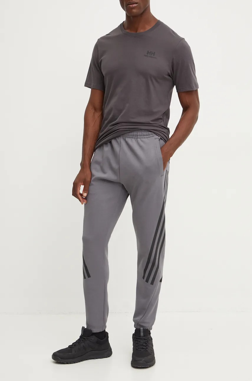 adidas pantaloni de trening Future Icons culoarea gri, cu imprimeu, IW8535 adidas pantaloni de trening Future Icons culoarea gri, cu imprimeu, IW8535