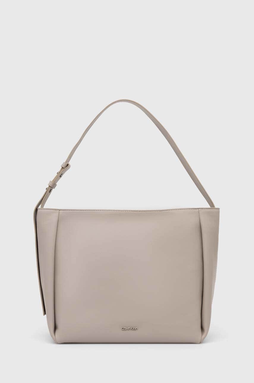 Levně Kabelka Calvin Klein béžová barva, K60K612129