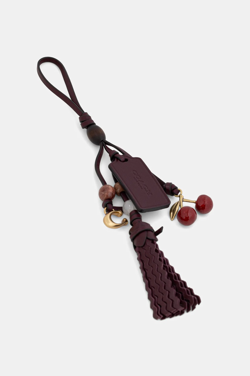 Levně Kožená klíčenka Coach CCD25