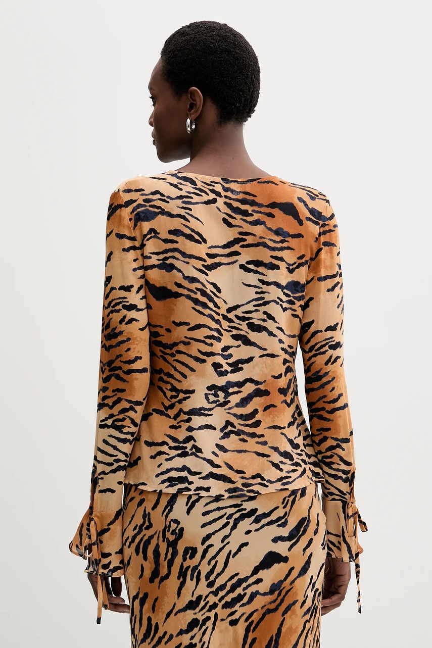 Halenka Never Fully Dressed (obrázek 3)