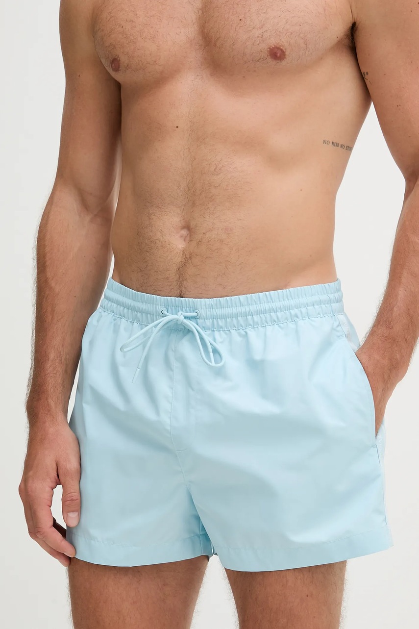 Levně Plavkové šortky Calvin Klein modrá barva, LV00N61108