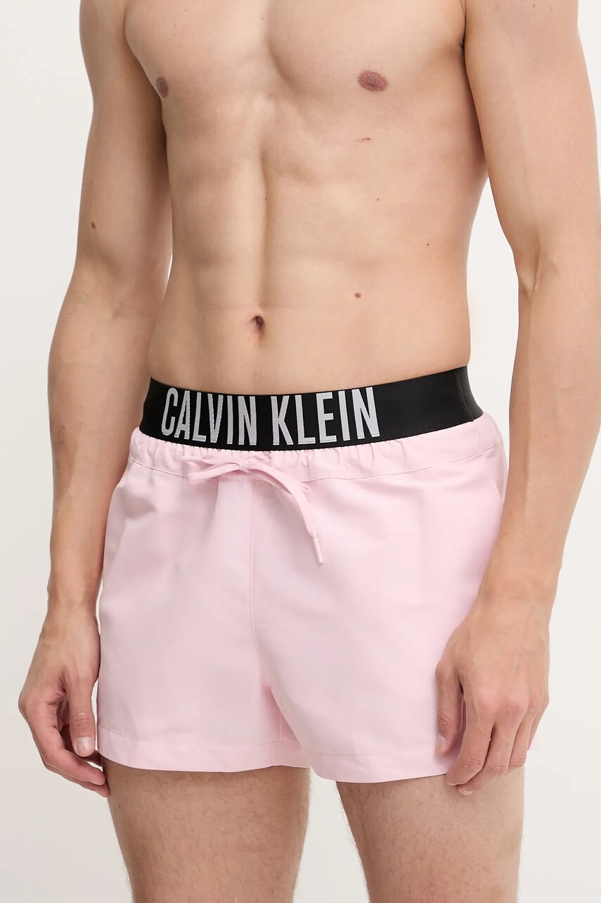 Levně Plavkové šortky Calvin Klein růžová barva, LV00N61094