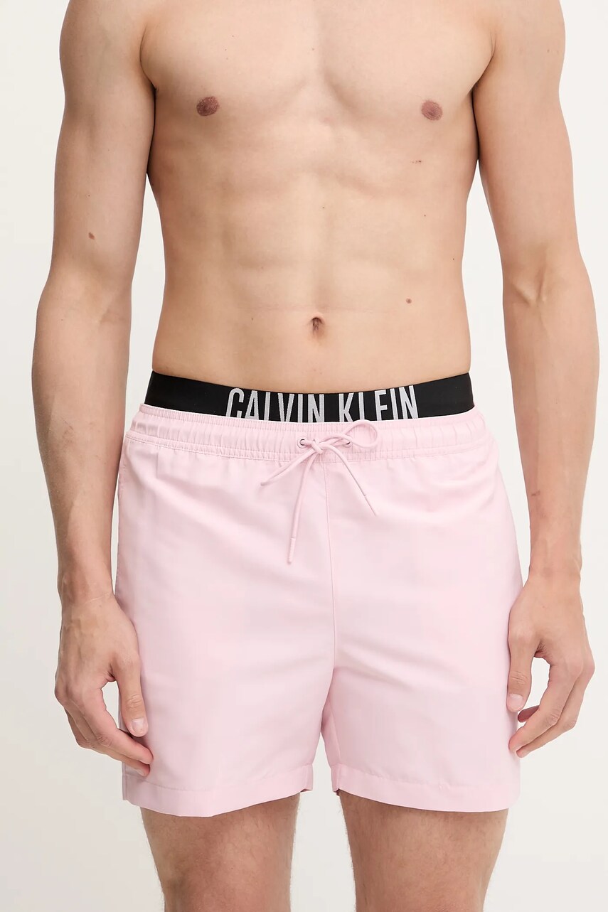Levně Plavkové šortky Calvin Klein růžová barva, LV00N61093