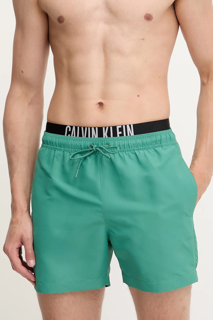 Levně Plavkové šortky Calvin Klein zelená barva, LV00N61093