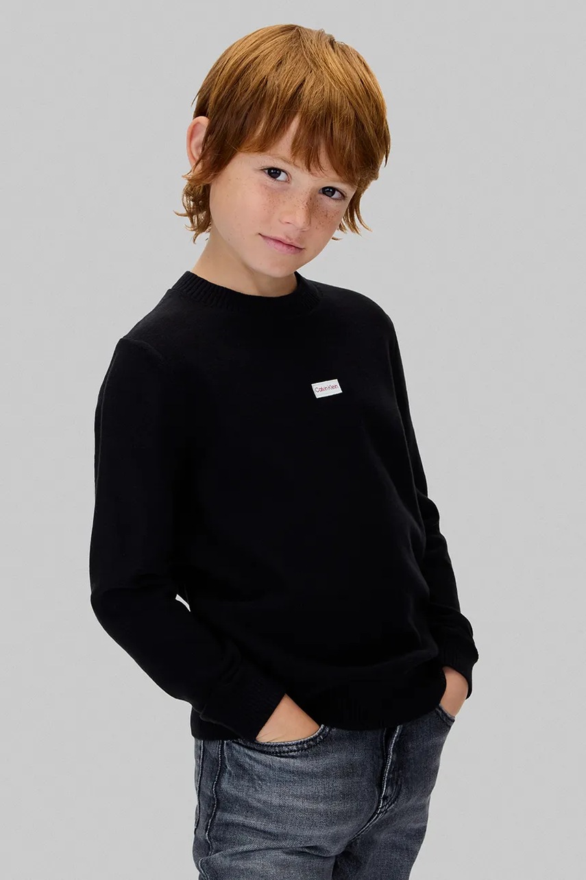 Levně Dětská bavlněná mikina Calvin Klein Jeans černá barva, s aplikací, IB0IB02596