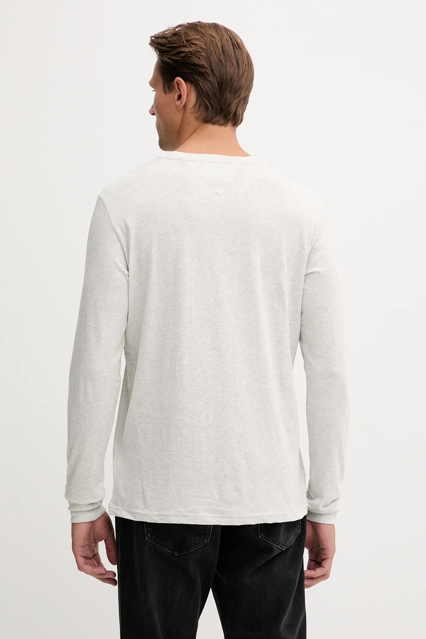 Βαμβακερή μπλούζα με μακριά μανίκια Tommy Jeans φωτογραφία