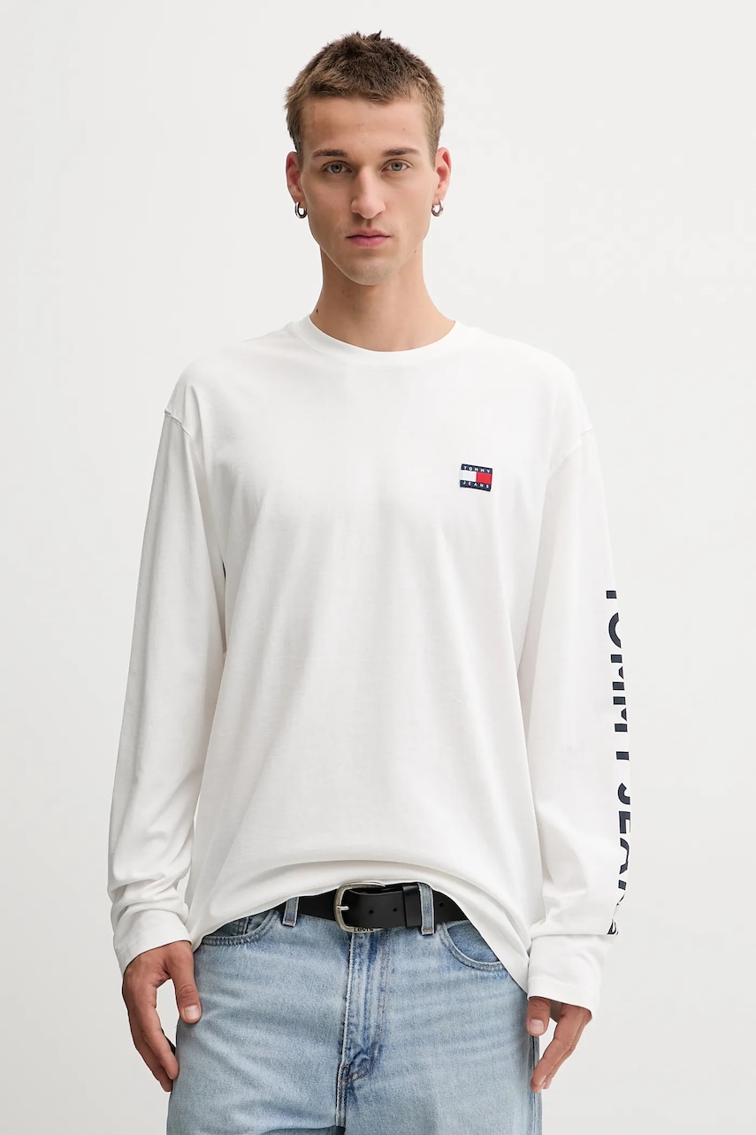 Levně Bavlněné tričko s dlouhým rukávem Tommy Jeans béžová barva, DM0DM21976