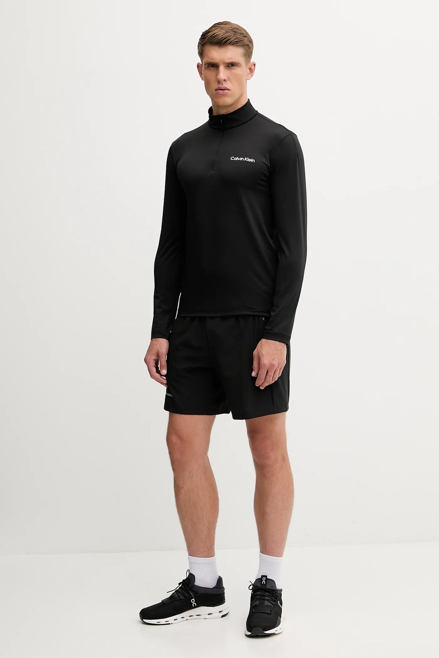 Лонгслив для тренировок Calvin Klein Performance цвет чёрный однотонный LVGMF5W303 Лонгслив для тренировок Calvin Klein Performance цвет чёрный однотонный LVGMF5W303