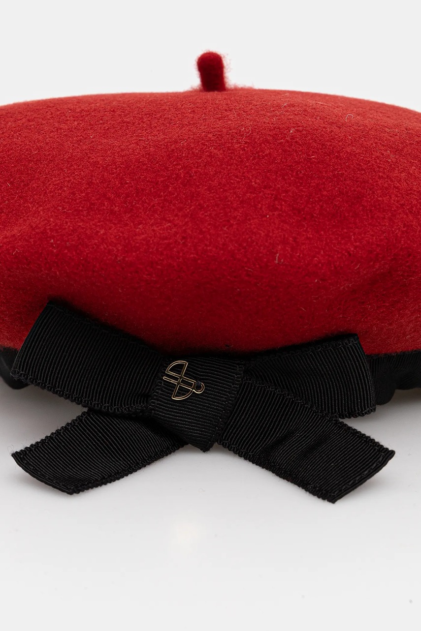 Μάλλινος μπερές Patou φωτογραφία