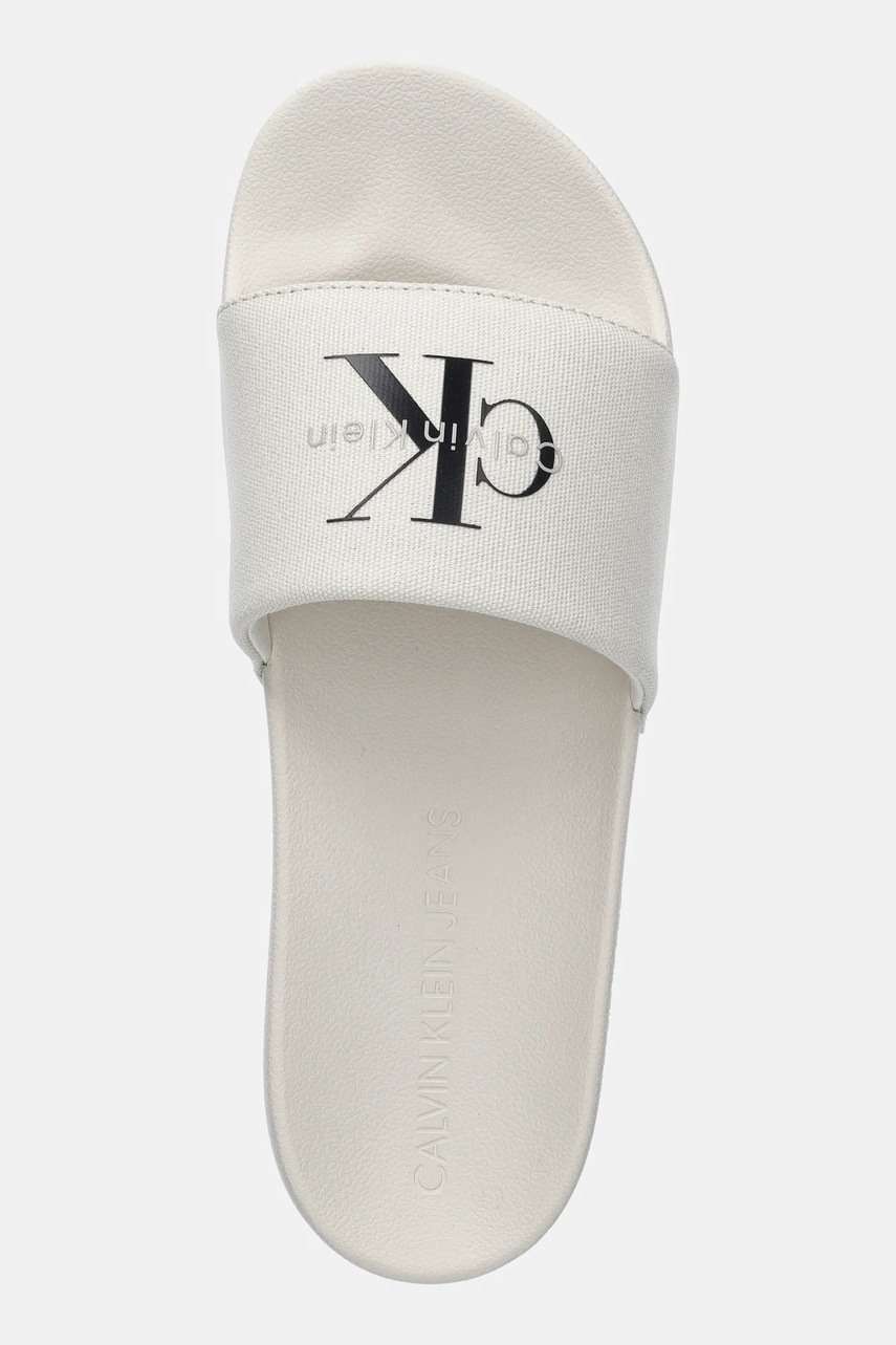 Παντόφλες Calvin Klein Jeans SLIDE MONOLOGO CV χρώμα: μπεζ, YM0YM01367 φωτογραφία