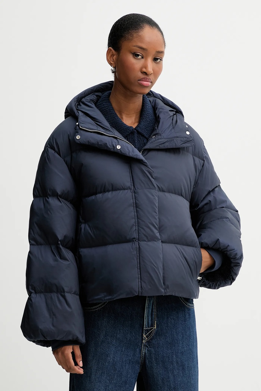 Levně Péřová bunda Calvin Klein tmavomodrá barva, zimní, oversize, LV044D525G