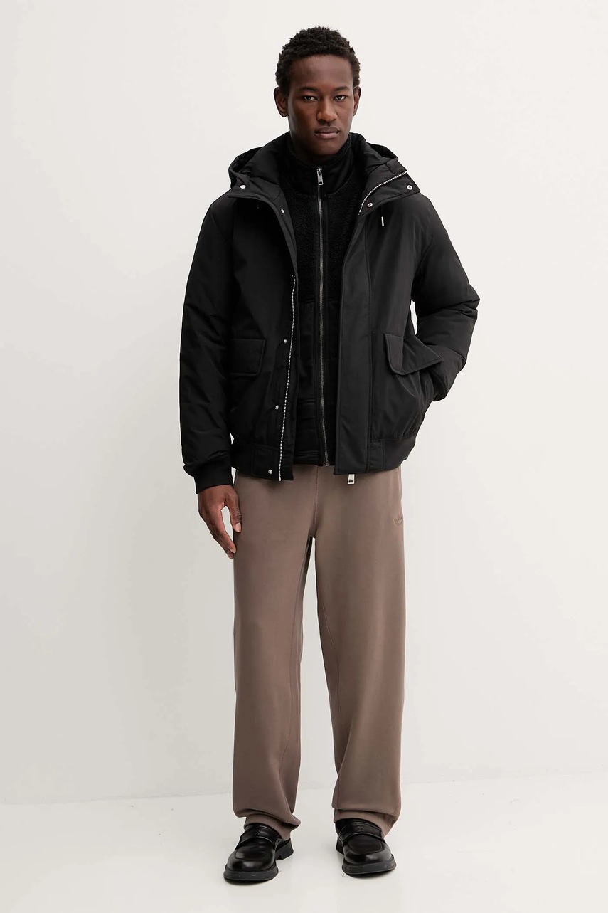 Куртка Tommy Jeans цвет чёрный зимняя DM0DM22032