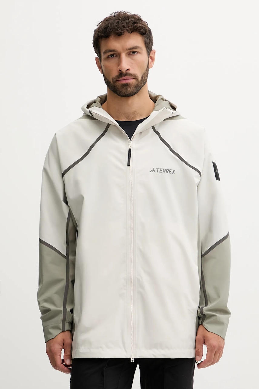 Levně Bunda adidas TERREX béžová barva, KC2342