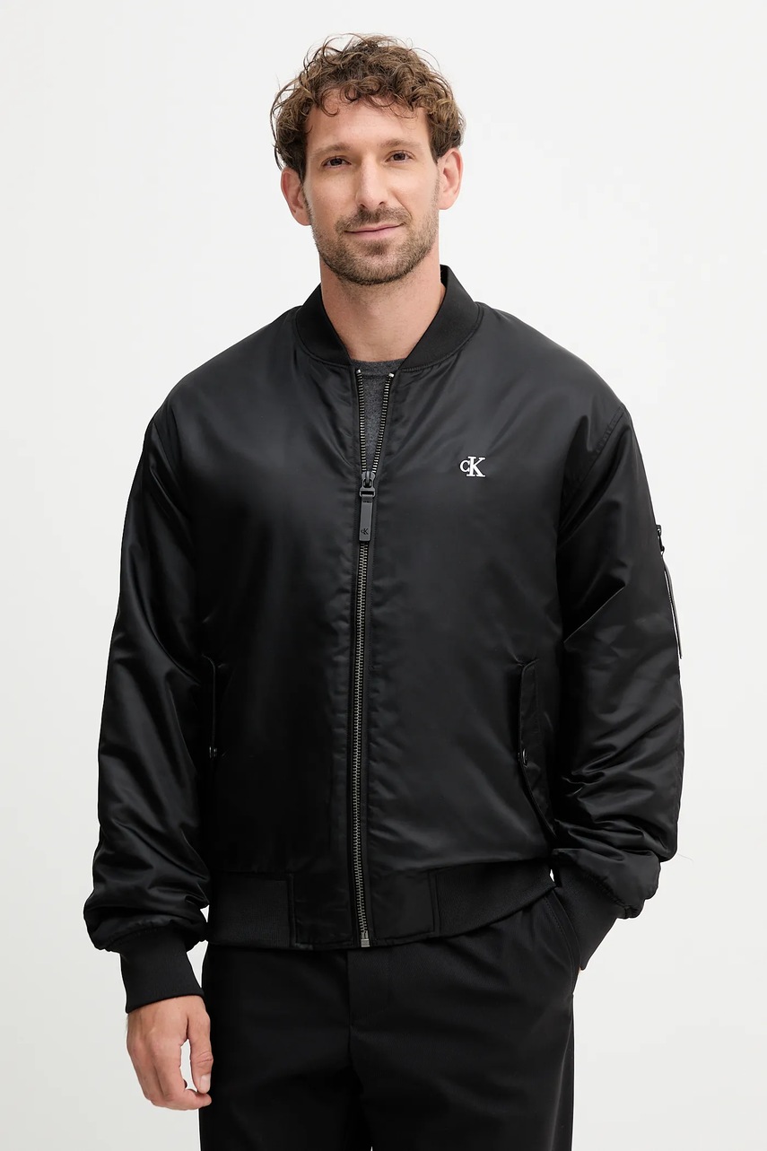 Levně Bomber bunda Calvin Klein Jeans černá barva, přechodná, oversize, LV04RC526G
