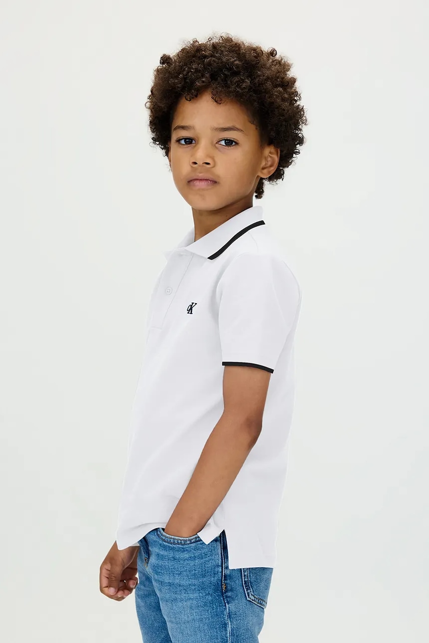 Levně Dětské polo tričko Calvin Klein Jeans bílá barva, IB0IB02230