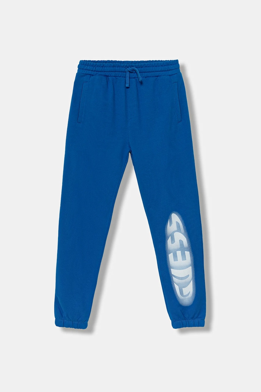 Levně Dětské bavlněné tepláky Guess modrá barva, s potiskem, L5YQ11 KAD74