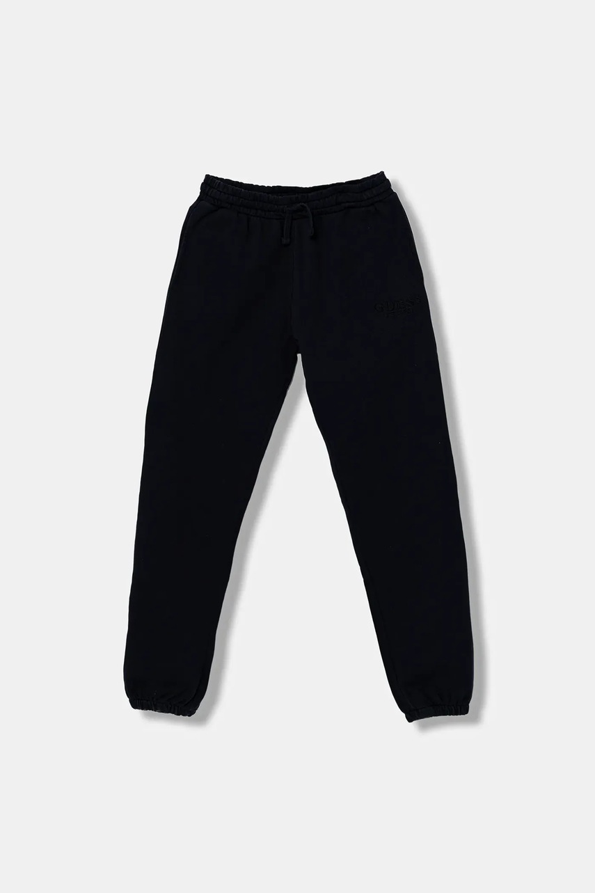Levně Bavlněné tepláky Guess tmavomodrá barva, s aplikací, L5YQ19 KAV34