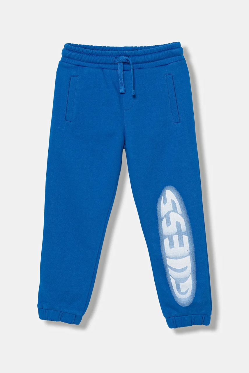 Levně Dětské bavlněné tepláky Guess modrá barva, s potiskem, N5YQ18 KAD74