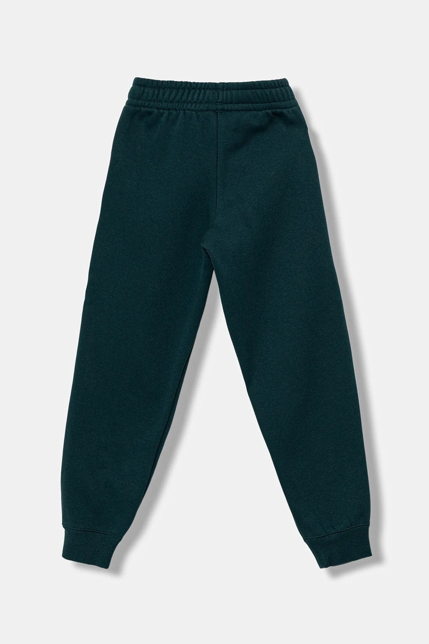 Детские спортивные штаны Puma ESS No. 1 Logo Sweatpants FL B цвет зелёный однотонные 684912