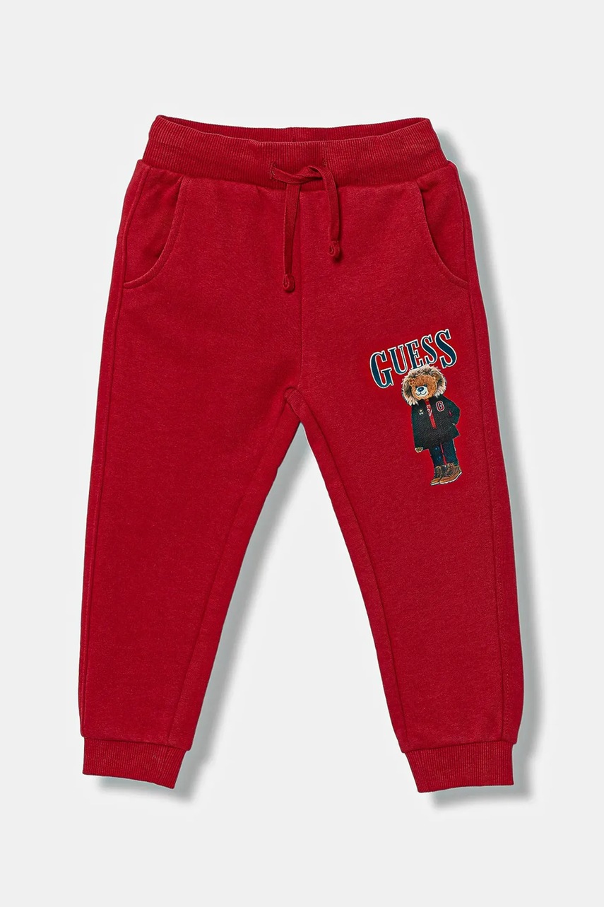 Levně Dětské bavlněné tepláky Guess červená barva, s potiskem, N5BQ12 KAD74