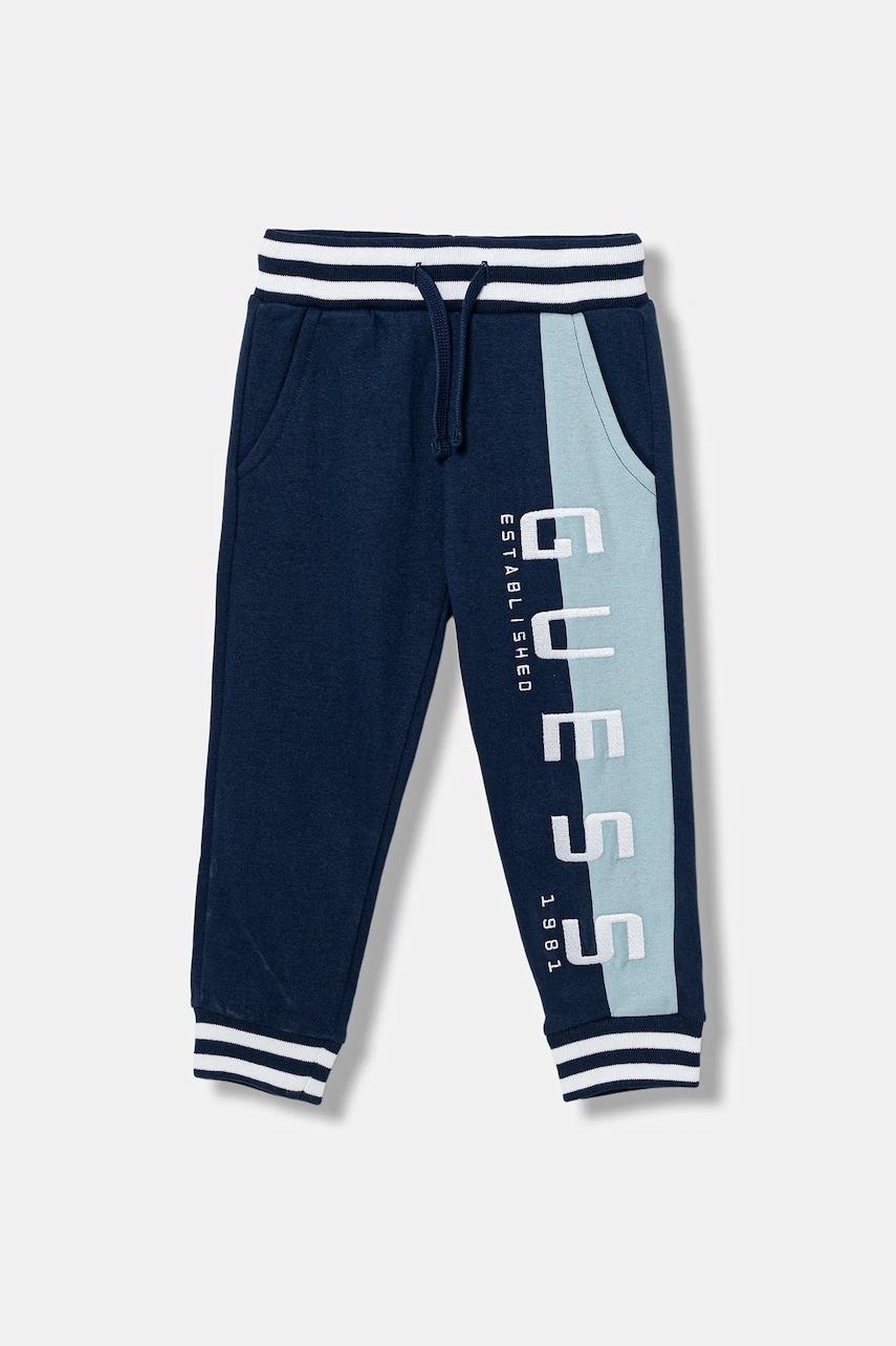 Levně Dětské bavlněné tepláky Guess tmavomodrá barva, N5BQ13 KAX74