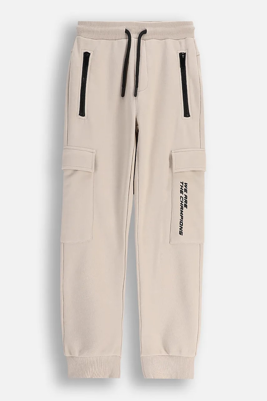 Coccodrillo pantaloni de bumbac pentru copii culoarea bej, uni, CITY RACING BOY JUNIOR