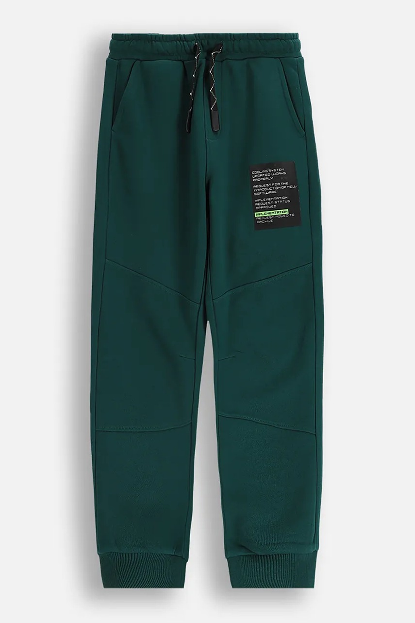 Детские спортивные штаны Coccodrillo цвет зелёный с принтом X-RAY VISION BOY JUNIOR