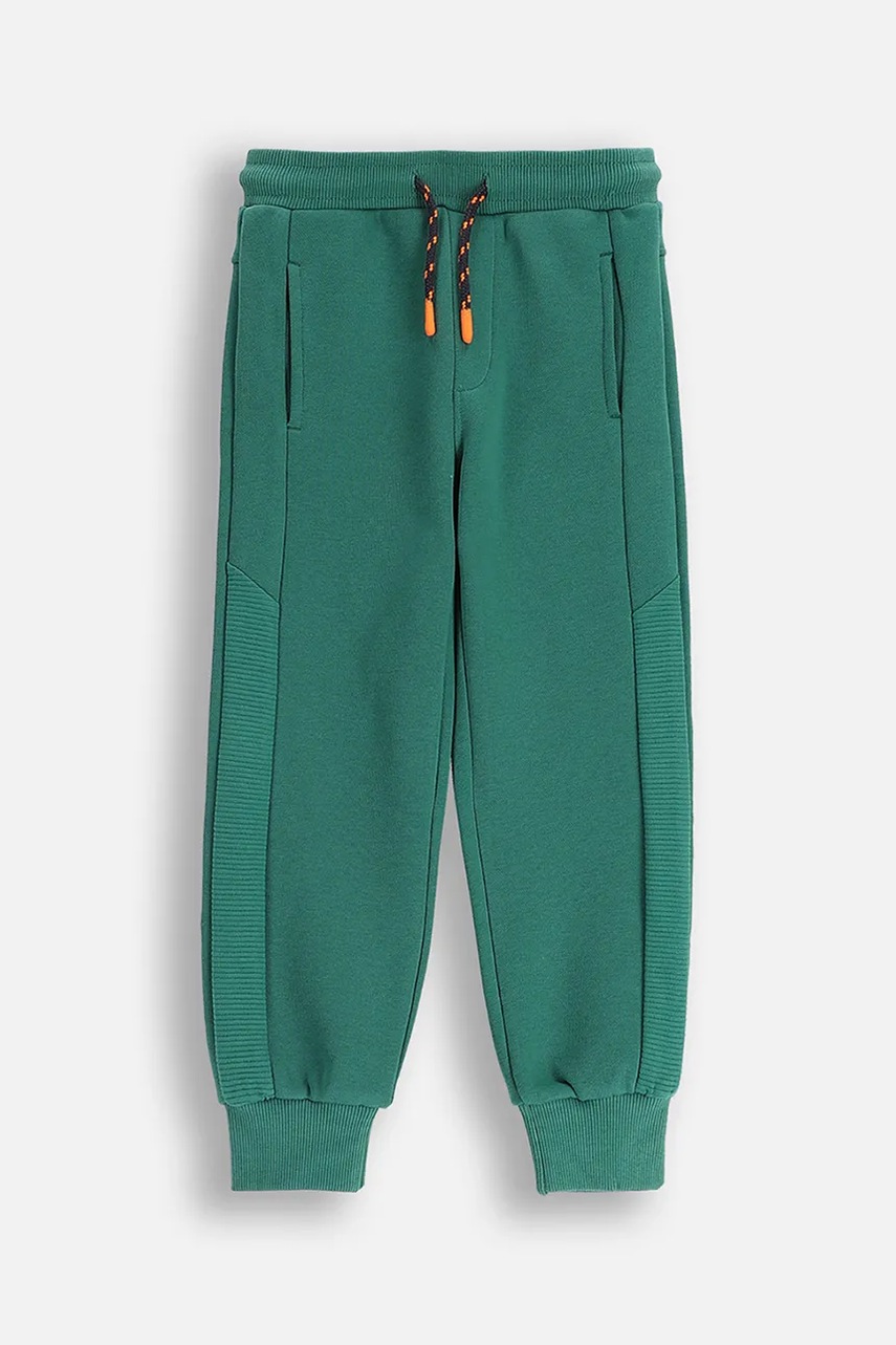 Levně Dětské tepláky Coccodrillo zelená barva, YETI BOY KIDS