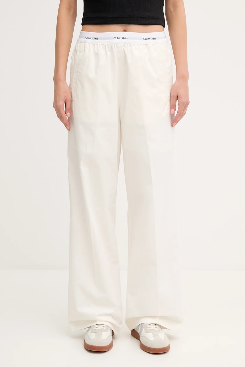 Levně Bavlněné kalhoty Calvin Klein Jeans dámské, béžová barva, široké, high waist, LV044C403G