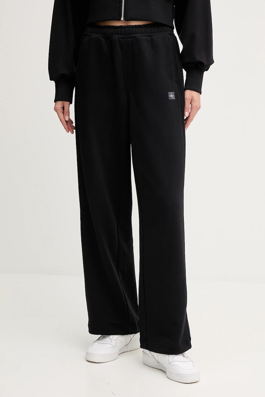 Levně Tepláky Calvin Klein Jeans dámské, černá barva, LV047C249G