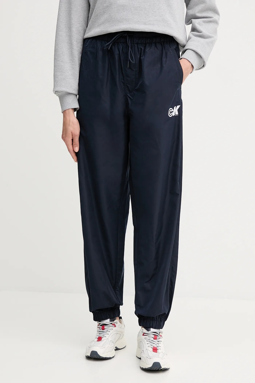 Levně Tepláky Calvin Klein Jeans dámské, tmavomodrá barva, s potiskem, LV047C627G