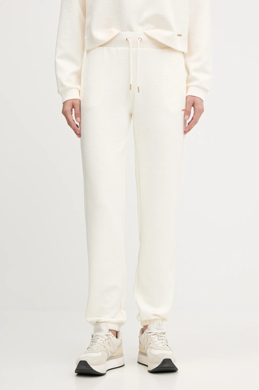 Levně Tepláky Guess PEONY dámské, béžová barva, V5YB06 KBSL2