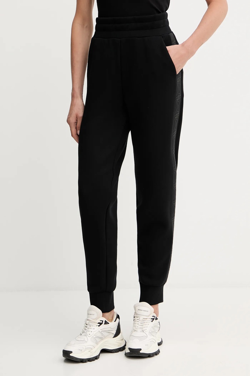 Levně Tepláky Guess NEW VICTOIRE dámské, černá barva, s aplikací, W5YB11 KBYE2