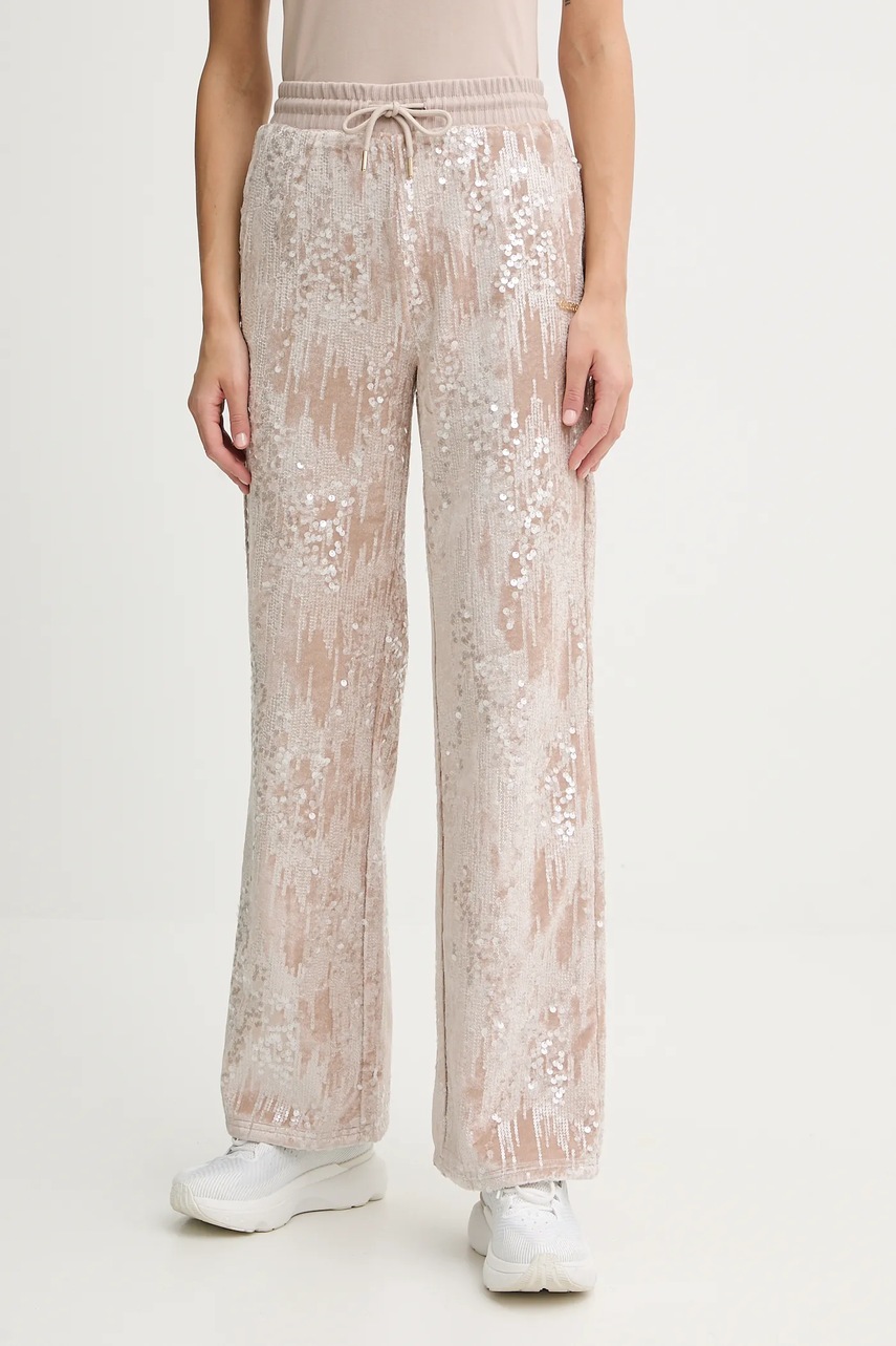 Levně Velurové teplákové kalhoty Guess dámské, béžová barva, s aplikací, V5BB01 K1922